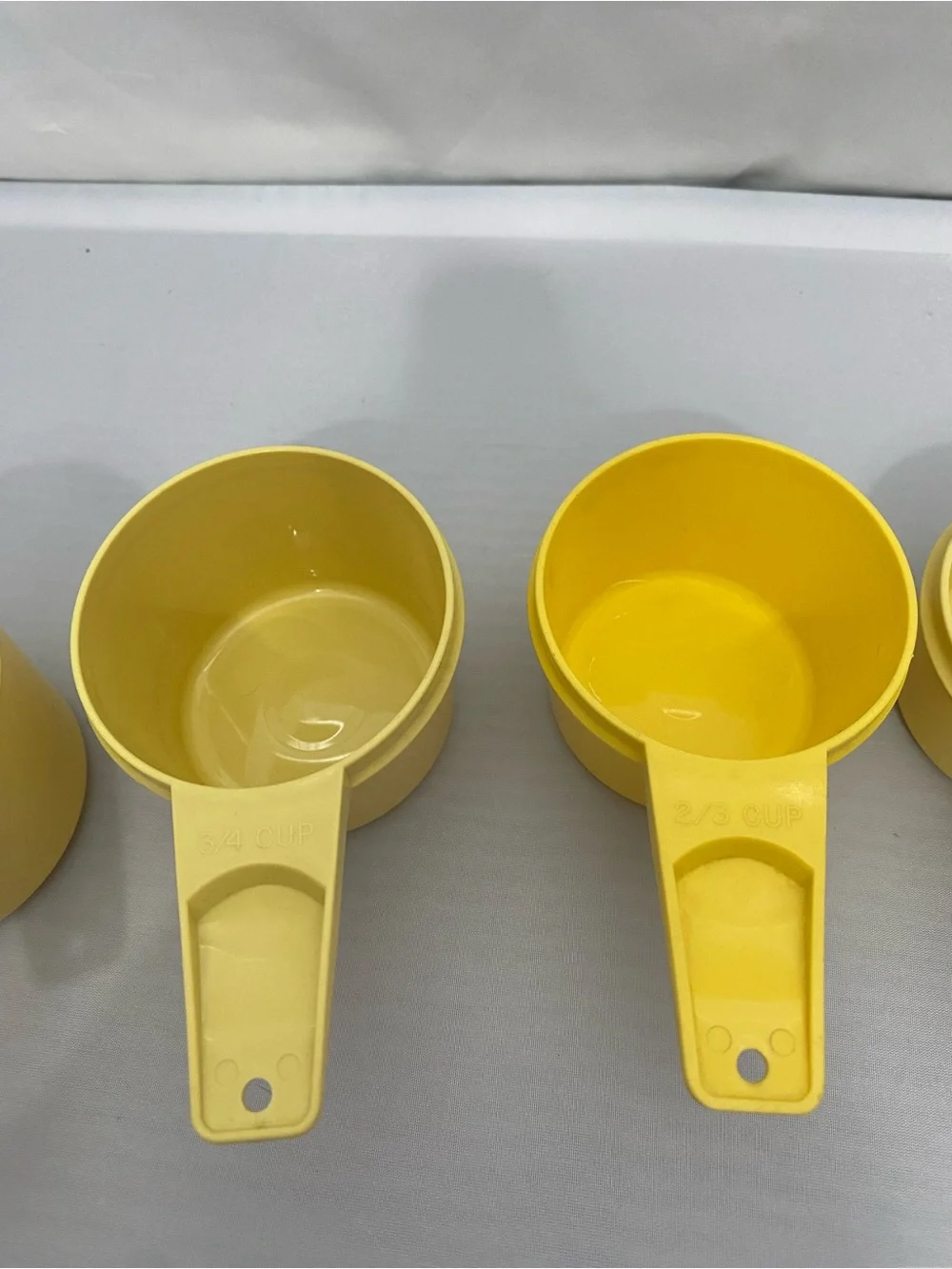 Yellow Plastic Measuring Cups